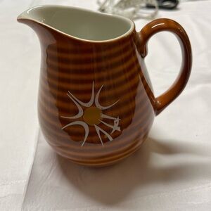 Brown and White Ceramic Accent Pitcher with Starburst Design